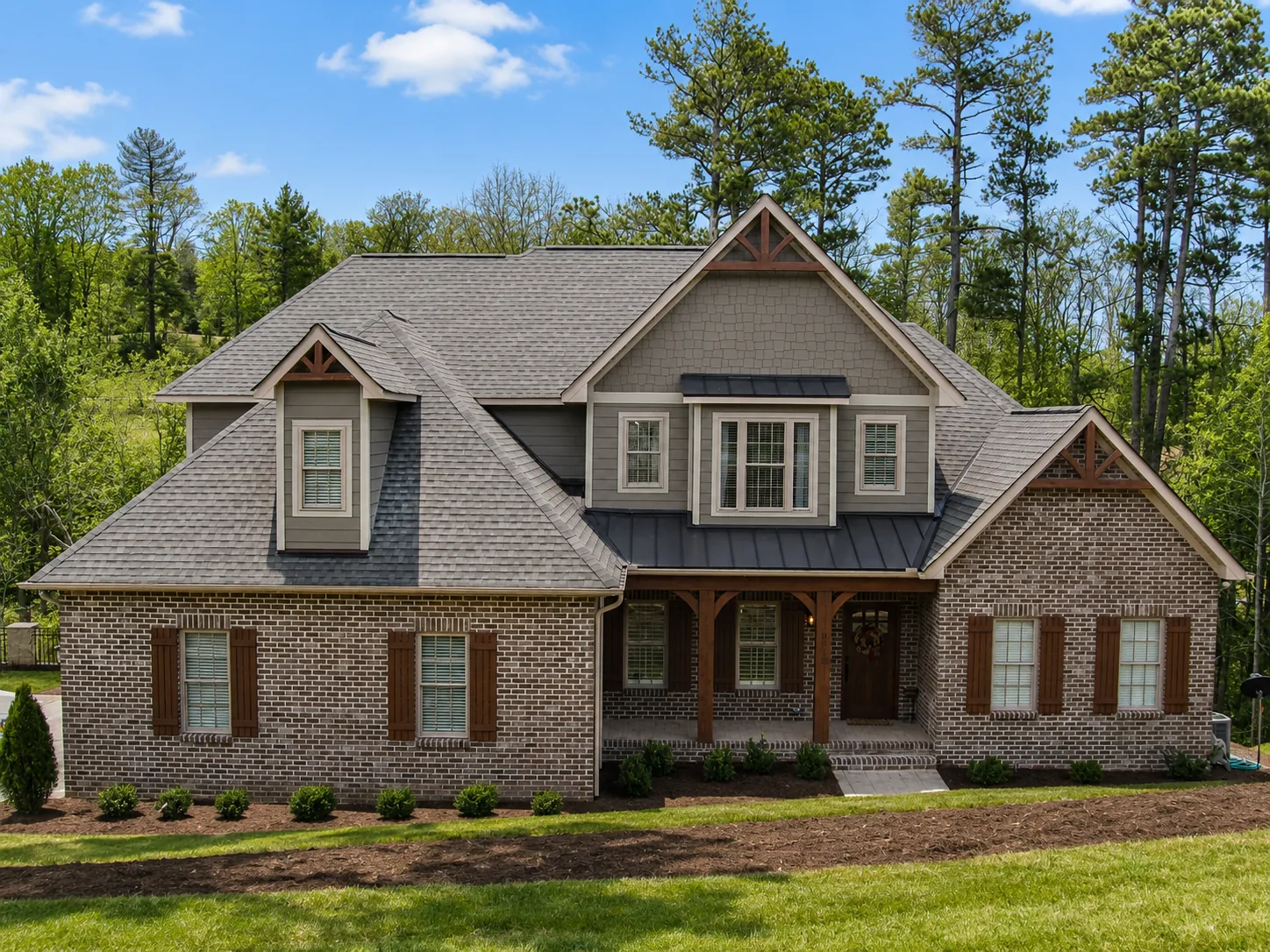 Custom luxury home exterior built by Higgins Building Group in Western North Carolina